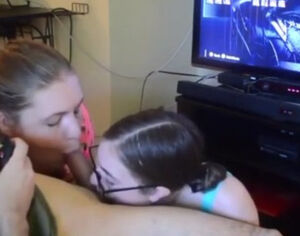 two girls suck one cock